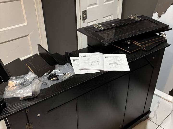 Media credenza assembly, in progress