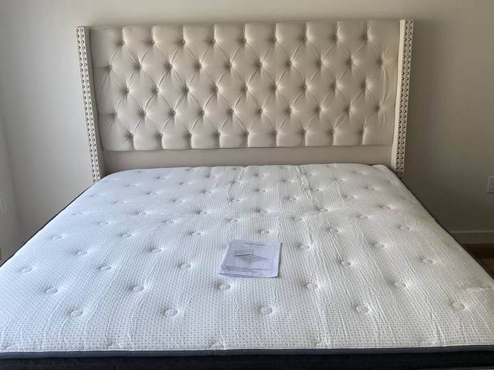 Tufted upholstered bed frame